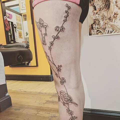 Bird and flower sketch tattoo