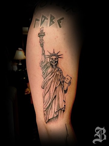Spooky Statue of Liberty tattoo