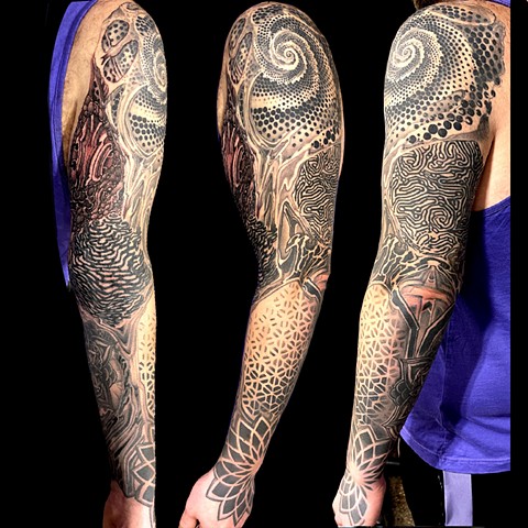 Geometric fractal sleeve tattoo 