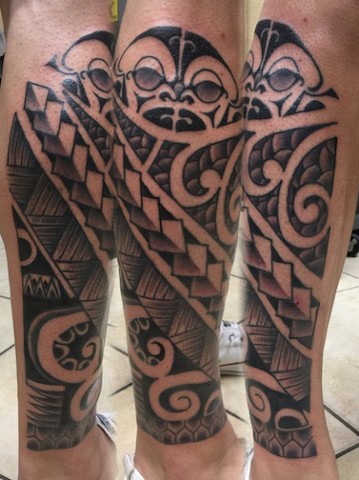 Tribal calf tattoo