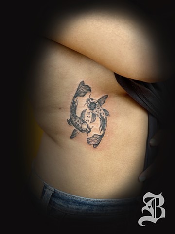 Koi fish yin yang tattoo