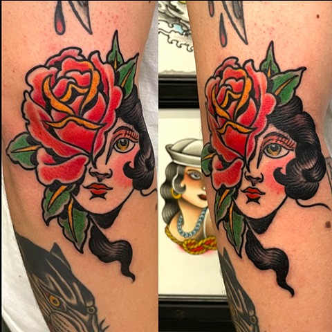 Rose and lady face tattoo 