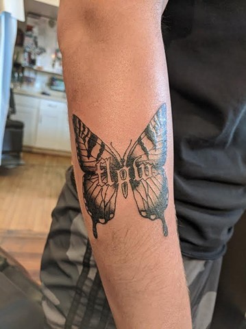 Butterfly flow tattoo