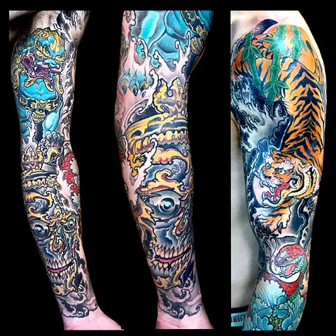 Fu dog and tiger sleeve tattoos 