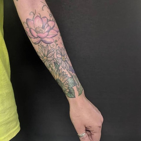 Floral forearm tattoo