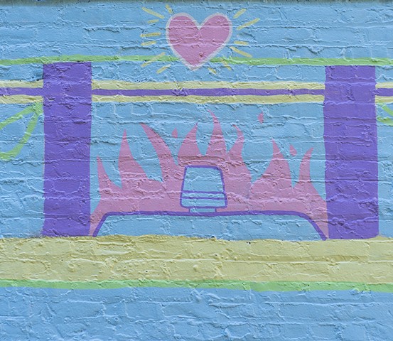 detail of cop car on fire, with a heart radiating with light, shining above 