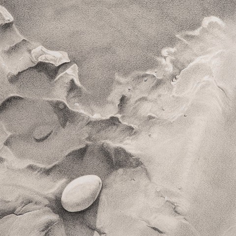 Graphite drawing of white stone on beach with sand formation/water