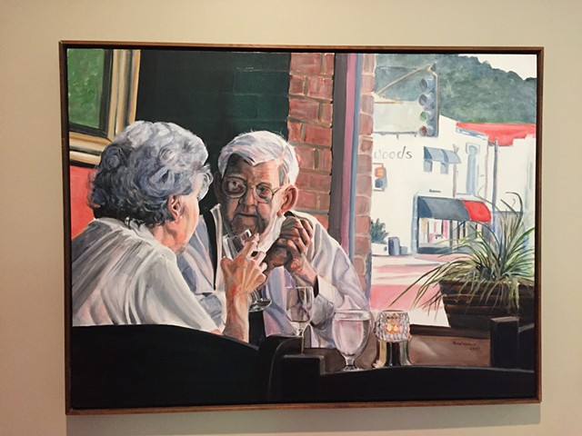 Do You Remember?  is a senior couple engaged in deep conversation in a restaurant.