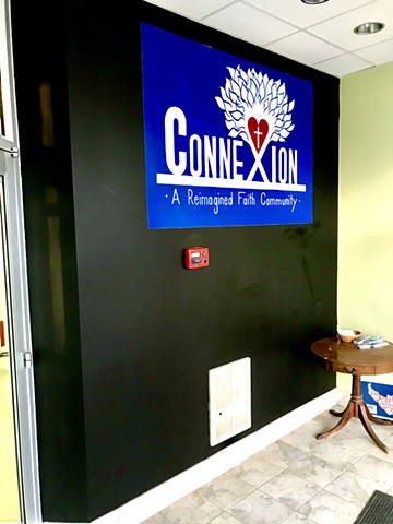 Connexion Logo painted in Connexion's entrance