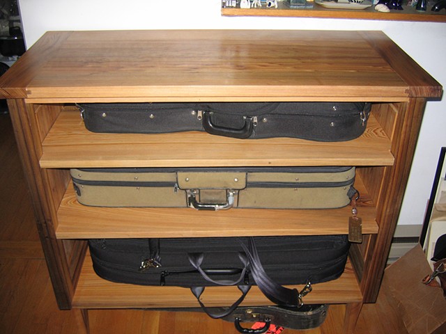 Viola storage shelves with violas for a musician in Boston.