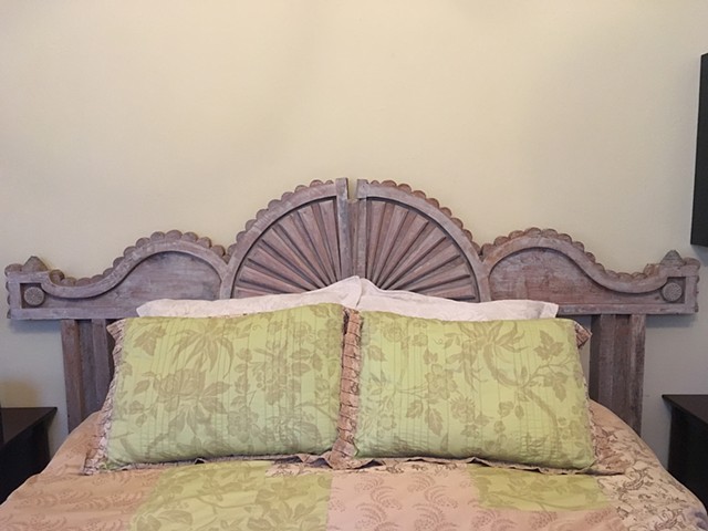 Headboard made from New Orleans architectural brackets. Design by Jim and Nancy O'Neil