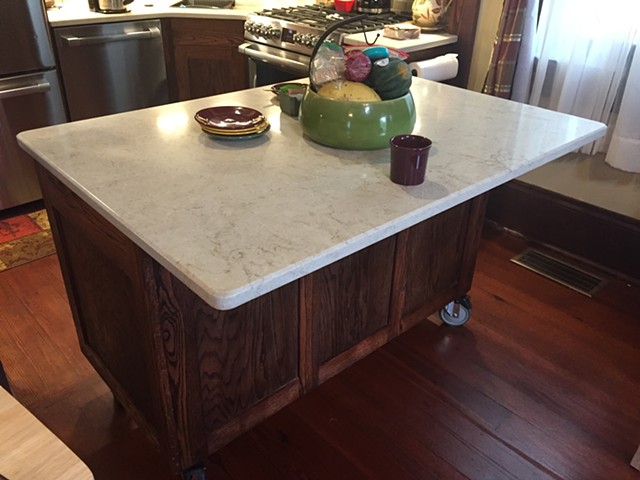 Oak kitchen cart with room for seating