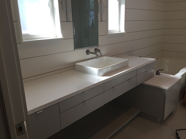 Bathroom sink and drawers designed by architect, Crystal Mitchell, for her New Orleans home