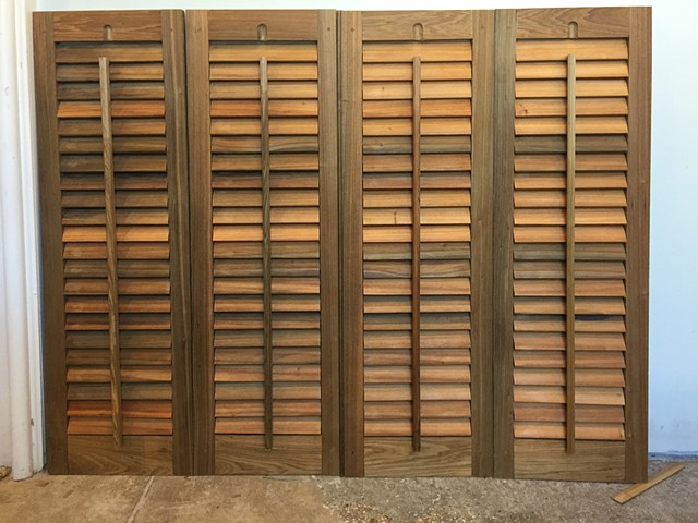 4 shutters waiting to be installed. Total of  24 operable interior shutters made of sinker cypress, for Felicity Church in New Orleans.