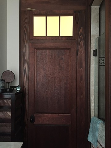 Spanish cedar bathroom door with transom