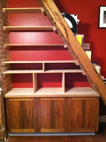 Cypress cabinet under stairs