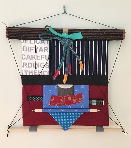 fiber art wall hanging 12" x 12" made with fabric, wood and thread influenced by Japanese aesthetics  by Rebecca Stuckey