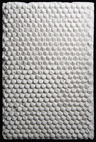 Cast  bubble wrap that reminds me of the wall panels at the Alhambra in Spain.