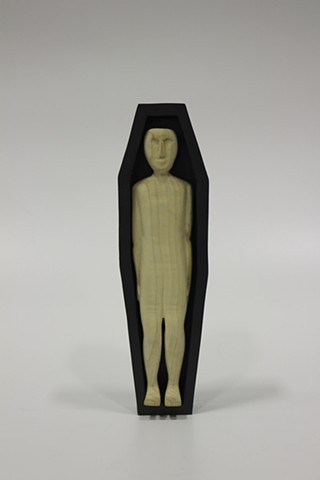 Carved wood sculpture with accompanying box