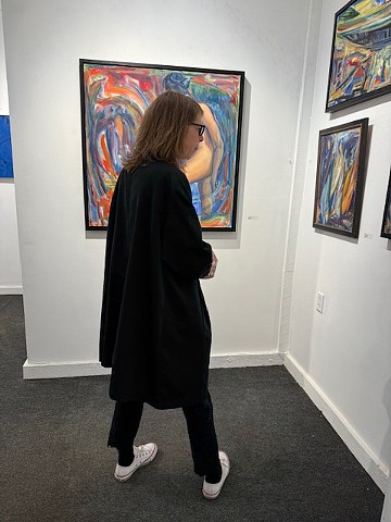 Jennifer Lord Rhodes looking at work by Cena Pohl Crane. Photo: Deb Ruggerio