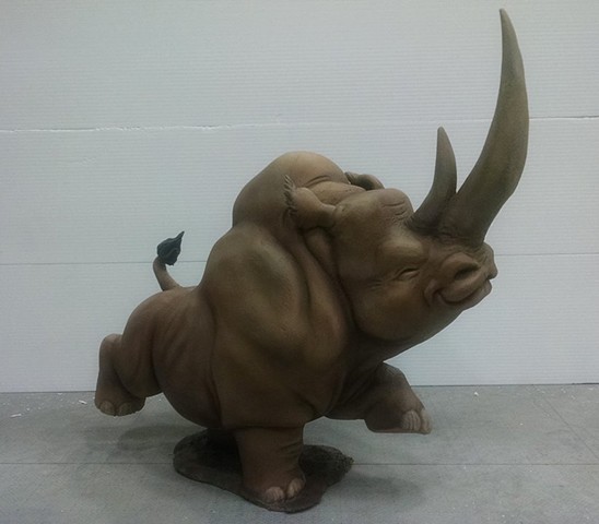 Cute happy dancing little rhinoceros