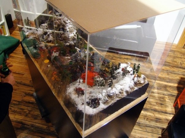 Blood Lake, paint, pewter gaming figurines, miniature landscape-building materials, 2008.
