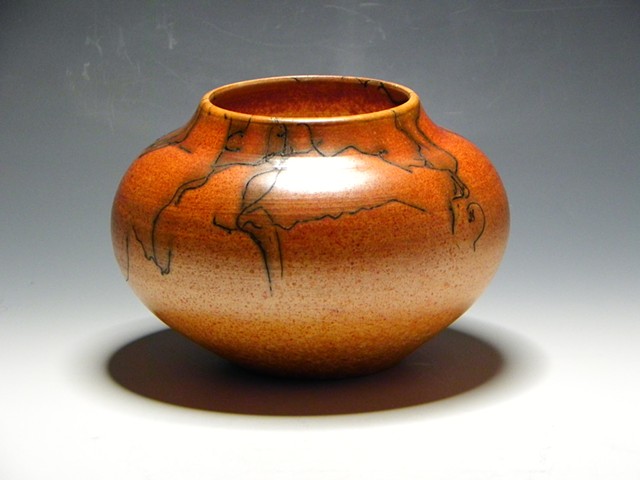 Ceramic vessel fired with horsehair