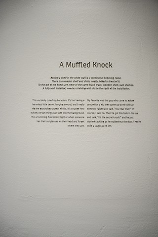 A Muffled Knock is a story engraved into the gallery wall. The story is of an insulation done a month prior to the show.