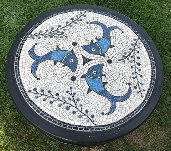 Coffee table inset mosaic based on 13th century ceramic fragment from Rakka, found in the Benaki Museum of Islamic Art in Athens, Greece.