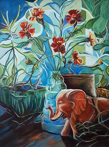 Still life featuring marigolds and elephant ceramic