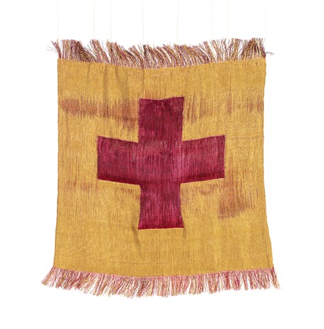 A textile with a red cross with a golden background and fringe at the top and bottom against a white background.