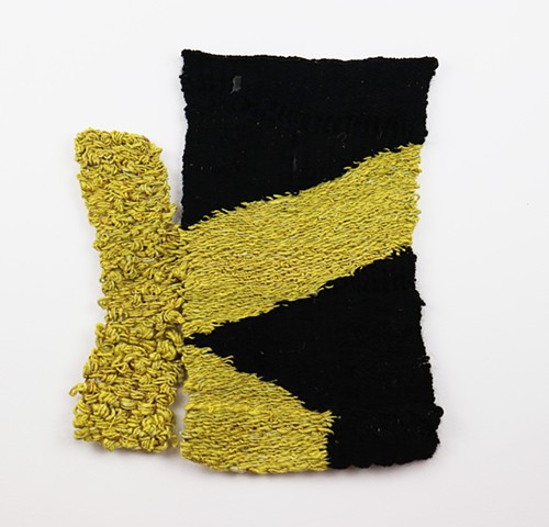 A black and yellow tapestry