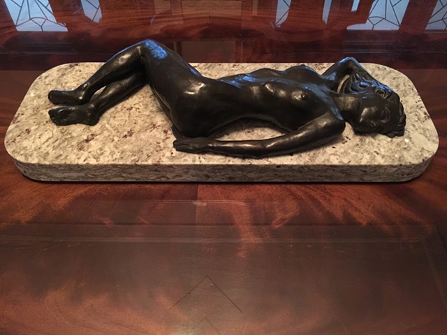 Bronze Figure Reclining