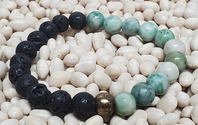 Black Lava Stone and Green Jade 8mm Beaded Stretch Yoga Healing Essential Oil Bracelet. Handmade unisex stretch bracelet made with 8mm black lava stone and jade beads, with brass accents. Each bracelet is made with double-strung .7mm stretch cord, so they