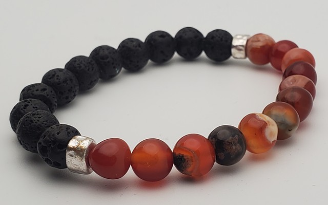 Lava & Agate half and half bracelet Black 8mm Beaded Stretch Yoga Healing Essential Oil Bracelet. Handmade unisex stretch bracelet made with 8mm black lava stone and red agate beads, with brass accents. Each bracelet is made with double-strung .7mm stretc