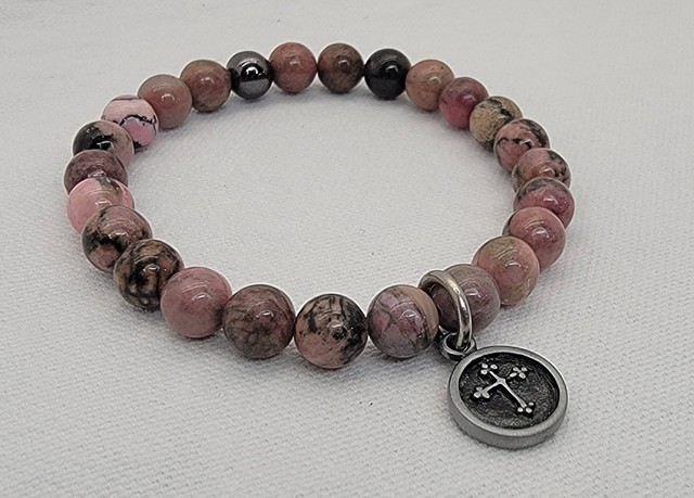 Genuine Pink Rhodonite 8mm Gemstone Beaded Stretch Yoga Bracelet with Antiqued religious Cross Charm for Men and Women. Handmade stretch bracelet with 8mm pink Rhodonite beads and antiqued cross charm. Rhodonite grounds energy, balances yin-yang, promotes