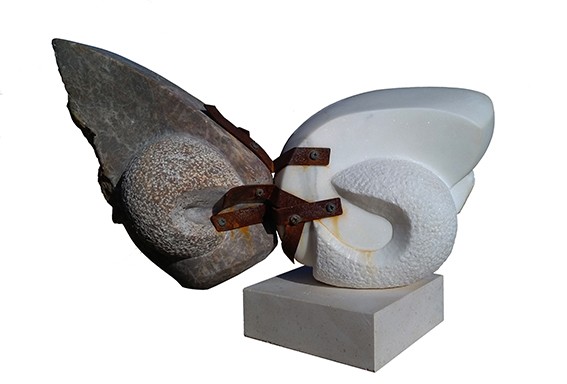 Cuban stone marble Sculpture represents opposing forms trying to separate steel linked by Aramis Justiz