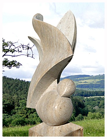 Cuban travertine stone sculpture symposium Germany hand carving peace dove public art by Aramis Justiz