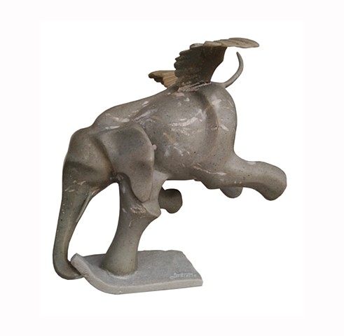 Animal elephant sculpture in marble resin with wings represent human being following feelings by Aramis Justiz