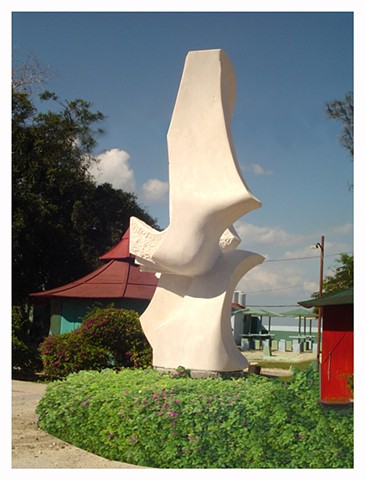 Cuban marble sculpture symposium Cuba hand carving bird public art by Aramis Justiz
