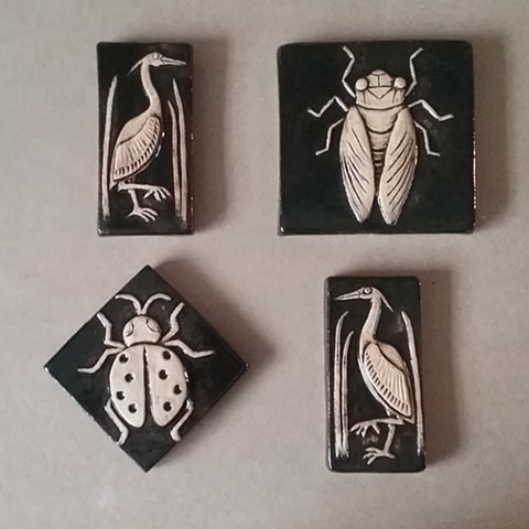 "Bugs and Birds"

Ceramic

Insect and bird handmade ceramic tiles in black glaze. 2x4, 3x3 and 4x4 inch sizes.




