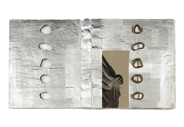 A one of a kind artist's book by Dianna Frid, made with cloth, photographic transfers, thread, and marble