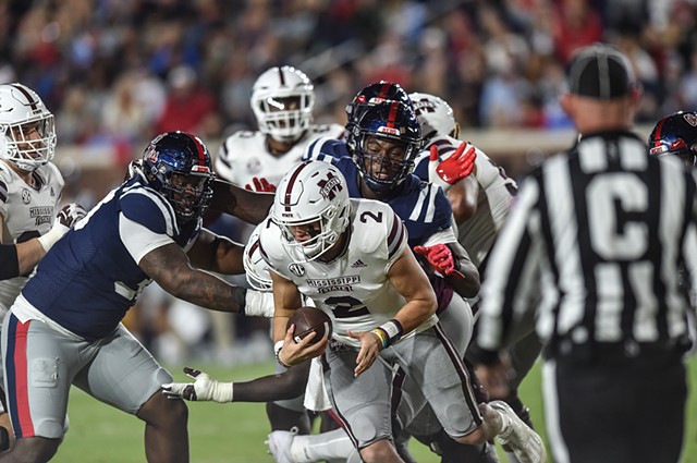 Mississippi State QB Will Rogers (2) avoids a tackle in the 2022 Egg Bowl at Ole Miss' Vaught-Hemingway Stadium in Oxford, Miss., Thursday, November 24, 2022.