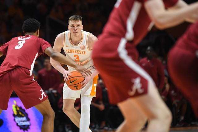 Tennessee guard Dalton Knecht (3) looks to pass as Alabama guard Rylan Griffen (3) blocks during the NCAA game against Alabama at Thompson-Boling Arena at Food City Center, Saturday, Jan. 20, 2024.