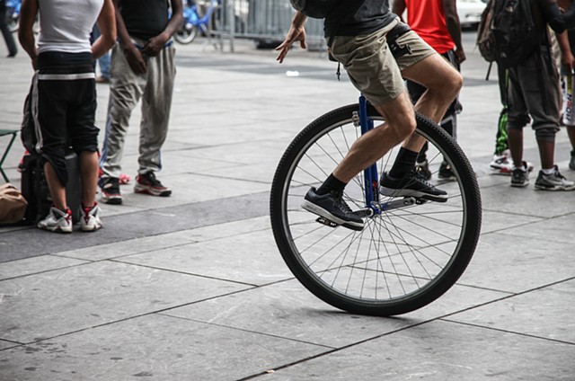 Unicyclists, some of whom had traveled from as far as Texas, gear up for their ride across Brooklyn for Brooklyn Unicycle Day in City Hall Park, Manhattan on September 4, 2015. 
