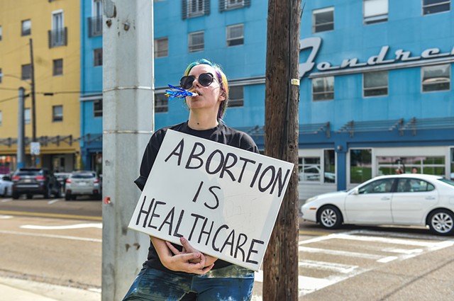 A protestor supporting abortion rallies outside of the Jackson Women’s Health Organization on the last day the clinic is legally allowed to be open in Jackson, Miss., Wednesday, July 6, 2022.