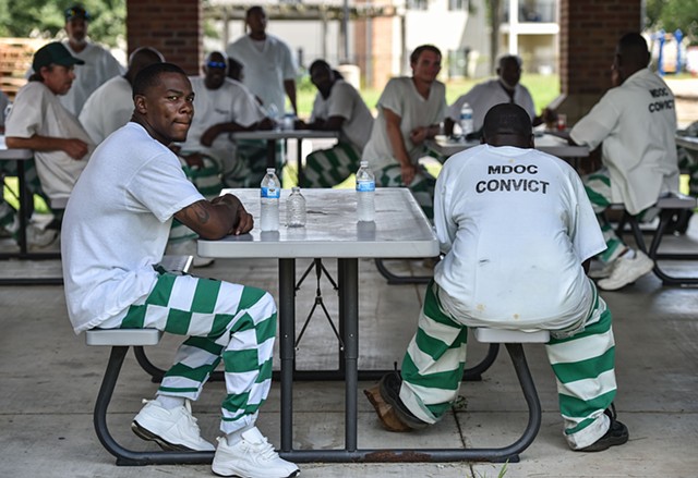 Bottles of water sit on a table after incarcerated persons helped hand out water amidst Jackson's water crisis at the Salvation Army facility in Jackson, Miss., Friday, September 2, 2022.
