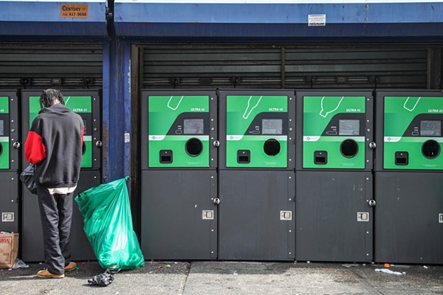 A homeless man deposits bottles at the Pathmark supermarket on 125th and Lexington Avenue on September 28, 2015.