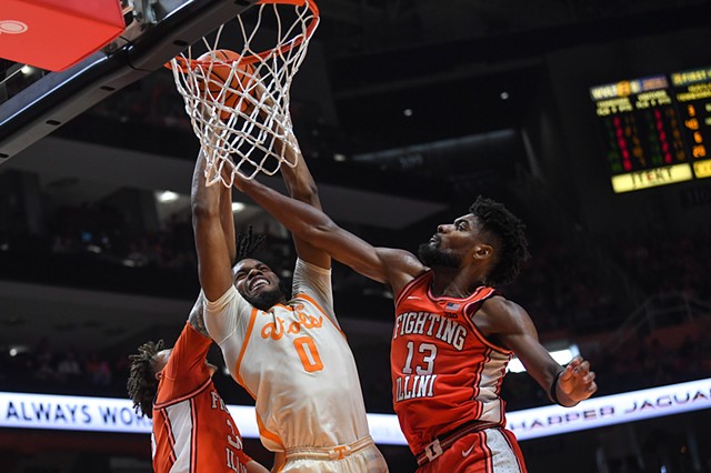 Tennessee forward Jonas Aidoo (0) blocks Illinois guard/forward Quincey Guerrier (13) while making a slam-dunk during an NCAA college basketball game between Tennessee and Illinois at Thompson-Boling Arena at Food City Center, Saturday, Dec. 9, 2023.