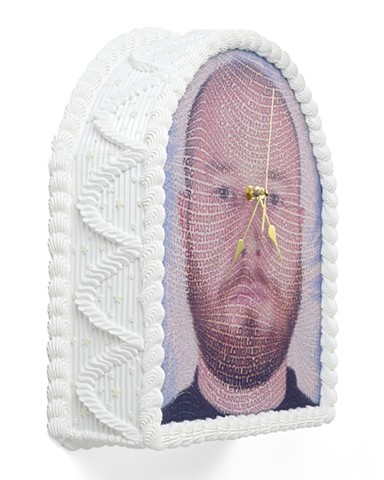 A structural, wall-mounted artwork crafted to resemble a multi-textured, cake. Elaborate piped acrylic frosting patterns create a frame around smooth, glossy resin panels embedded with a potrait made with an inkjet decal. The color palette accentuates the shadows and intricate textures of the sculptural cake design.